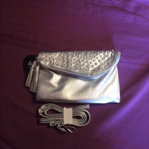 Brand new silver cross body/clutch purse