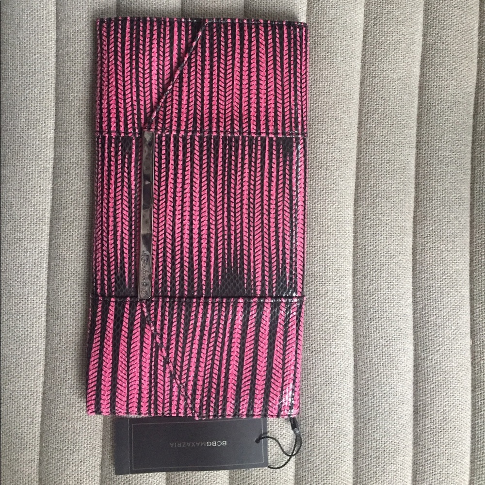 Brand new, with tags, BCBGMaxAzaria clutch.