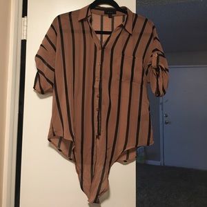 In new condition button up.