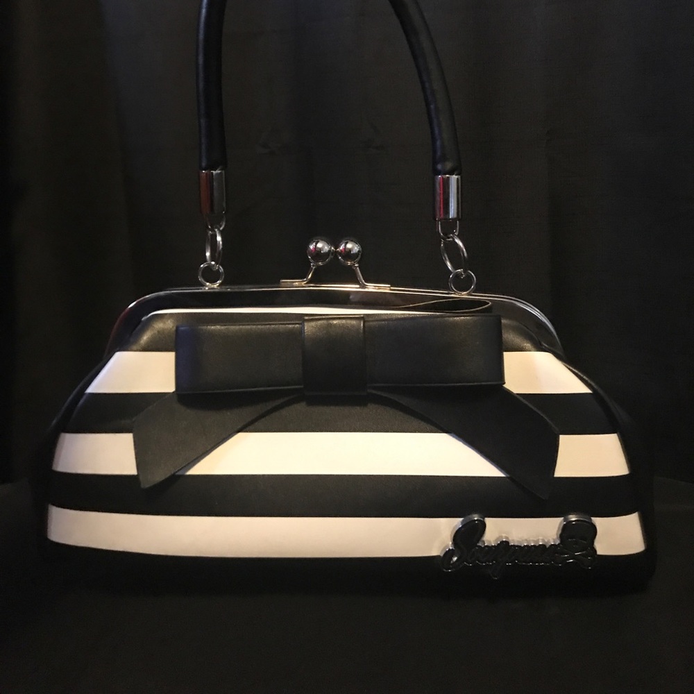 Sourpuss purse