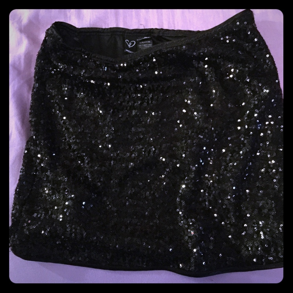 Sparkly black sequin mini skirt.