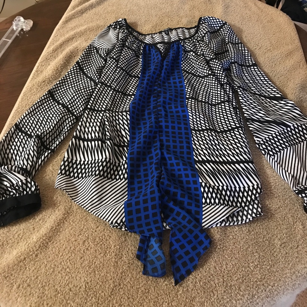 Black and white with blue blouse