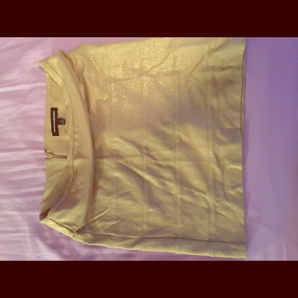 Express gold mini skirt.