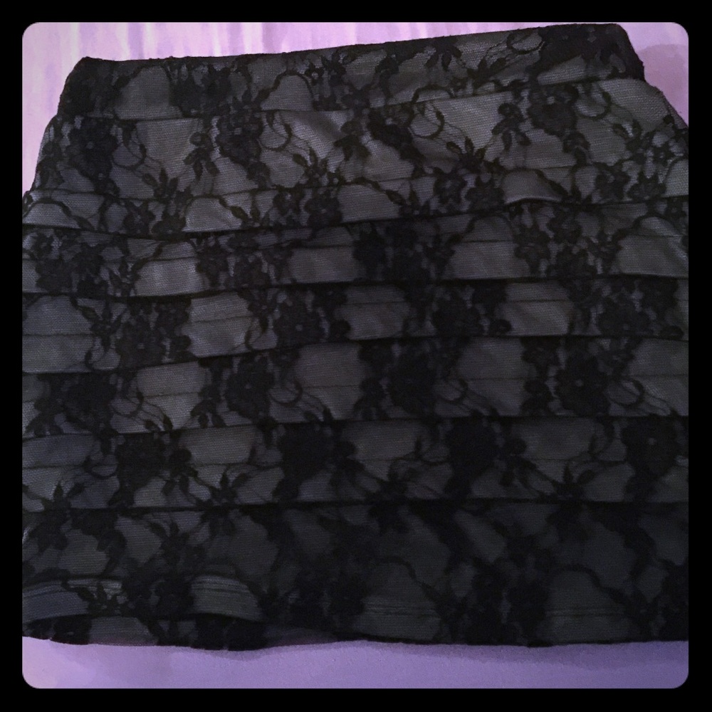 Gray skirt with black lace.