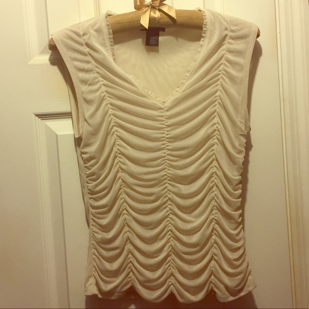 Cream sleeveless, draped blouse