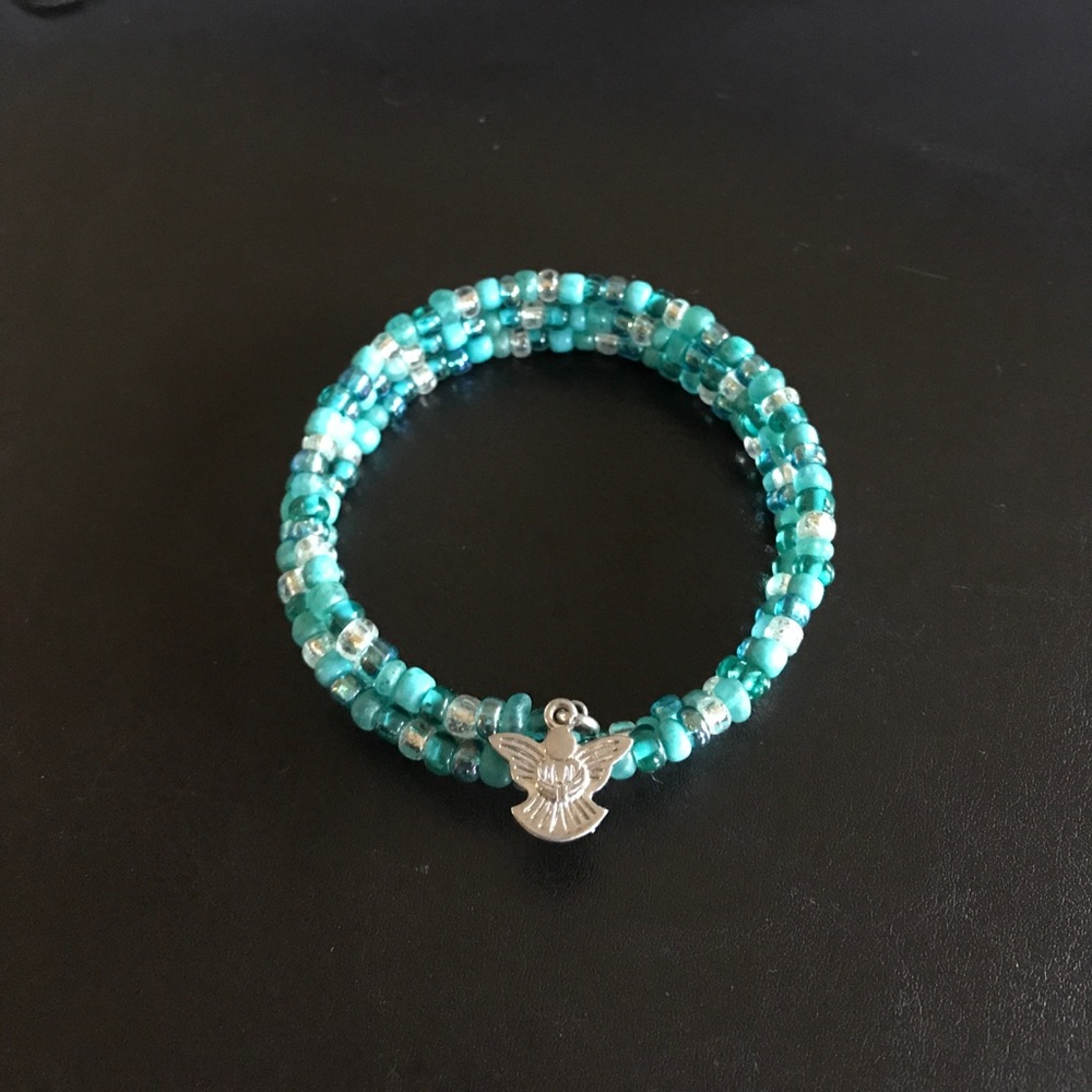 Teal/aqua colored bracelet with Angel charm