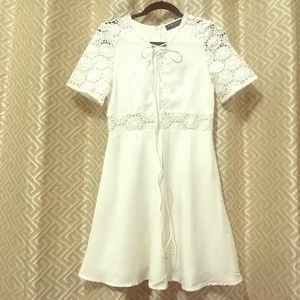 White mini dress with crochet knit accents