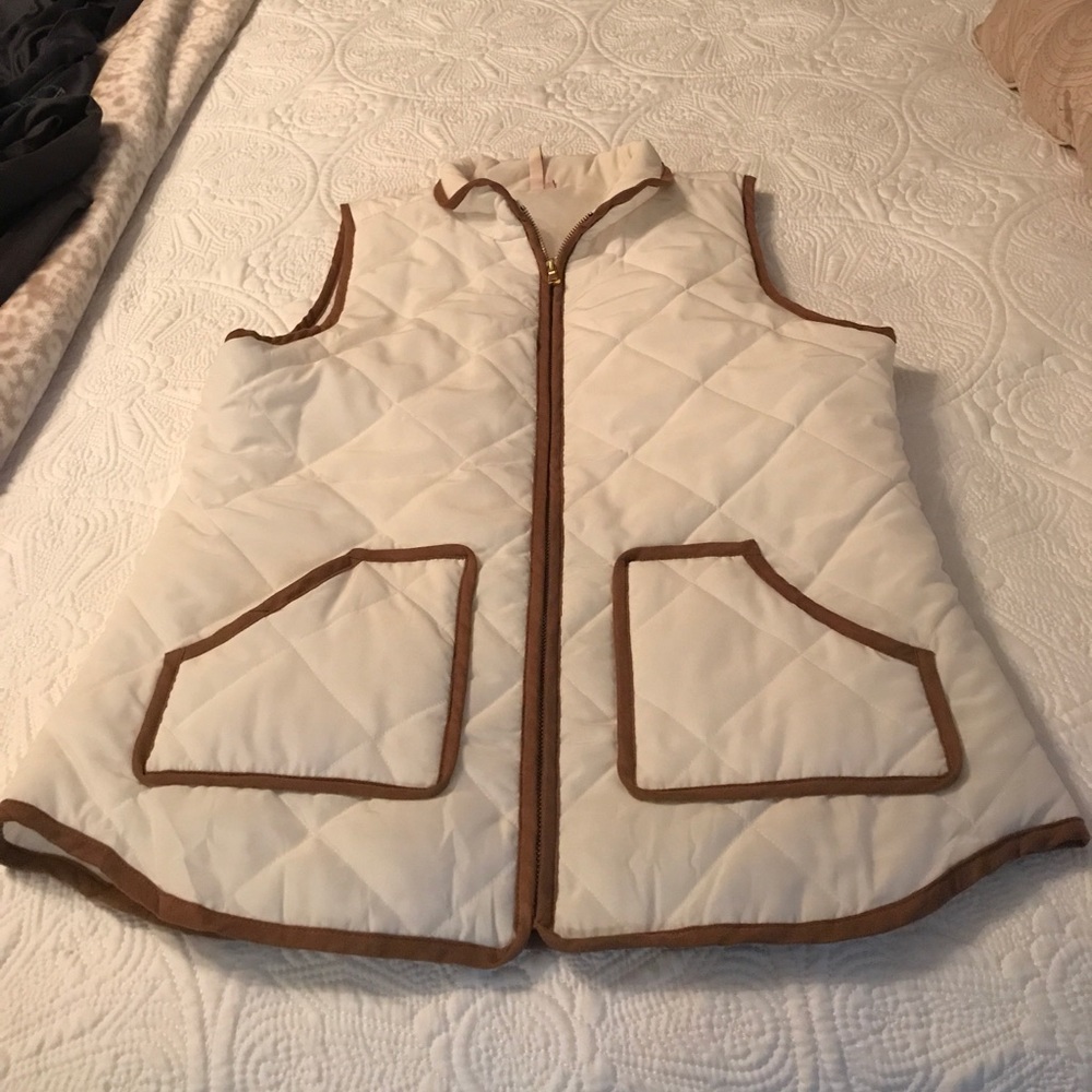 Cream vest with brown trim