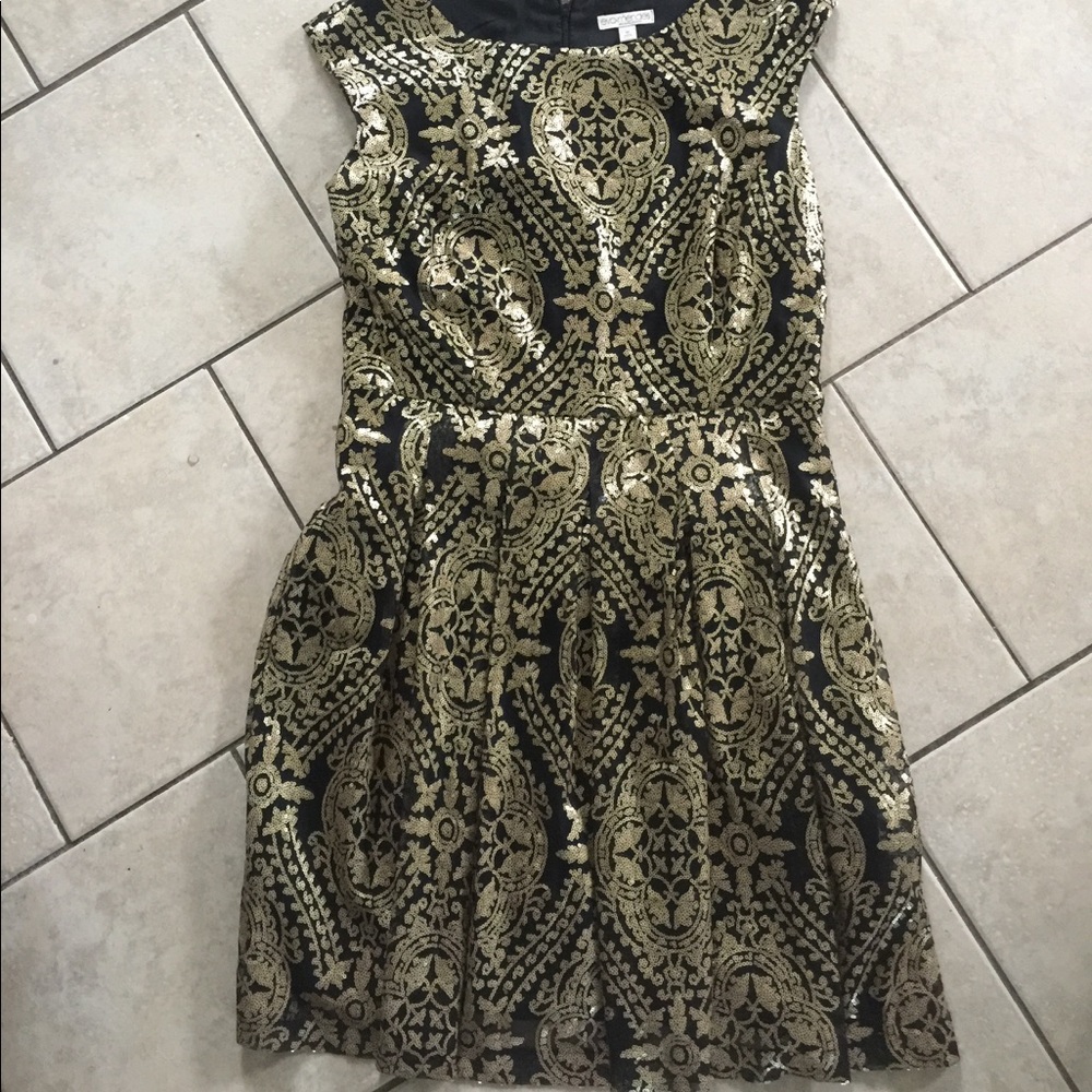 Black and gold sequin cocktail dress