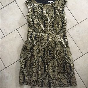 Black and gold sequin cocktail dress