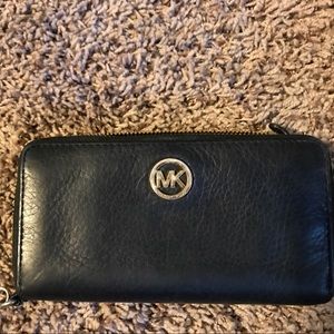 Black Michael Kors wallet, with wristlet