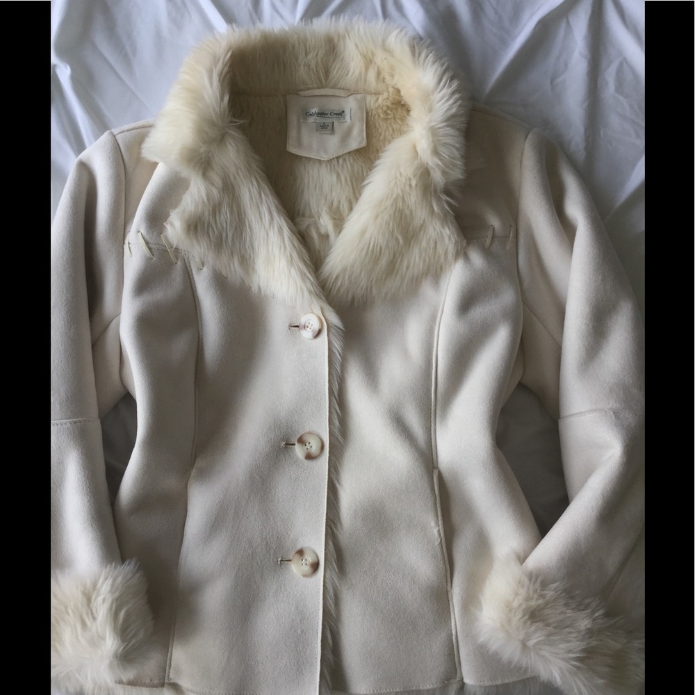 Ivory and faux fur coat.