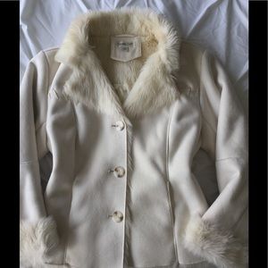 Ivory and faux fur coat.