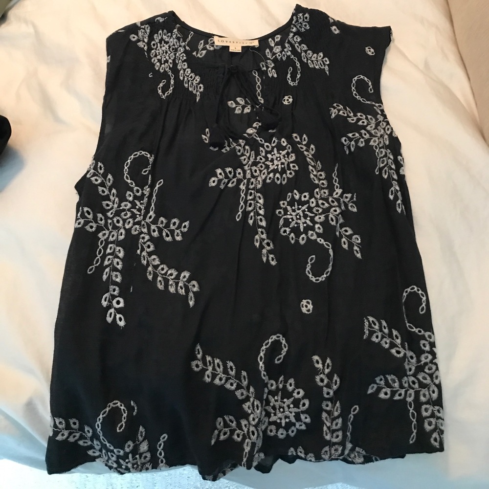 Tassled neck tie top