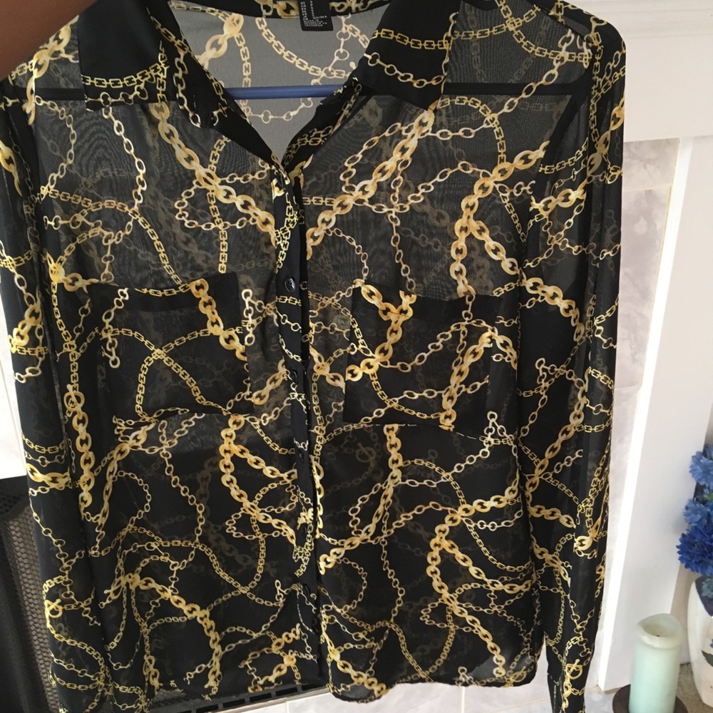 Black button up with chains on it