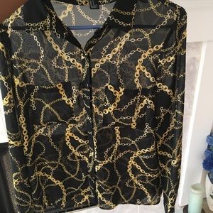 Black button up with chains on it