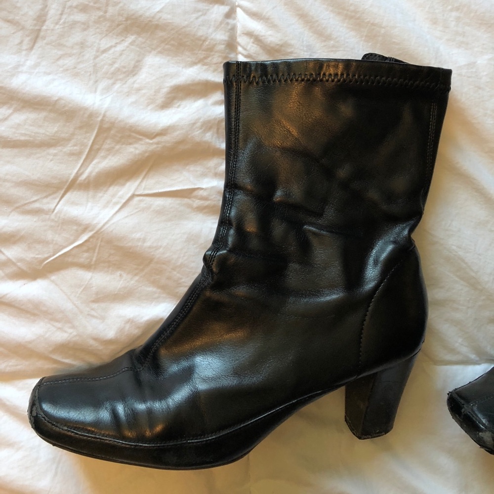Patent leather black side zip boots.