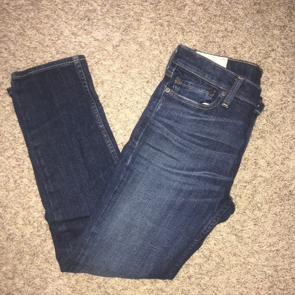 skinny jeans w/ mild distressing