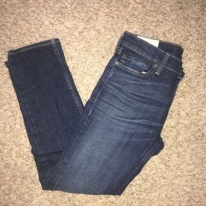 skinny jeans w/ mild distressing