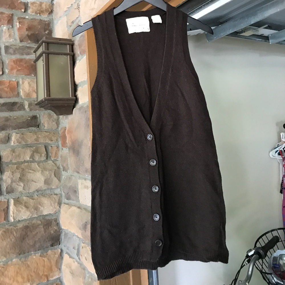 Sleeveless button up sweater vest