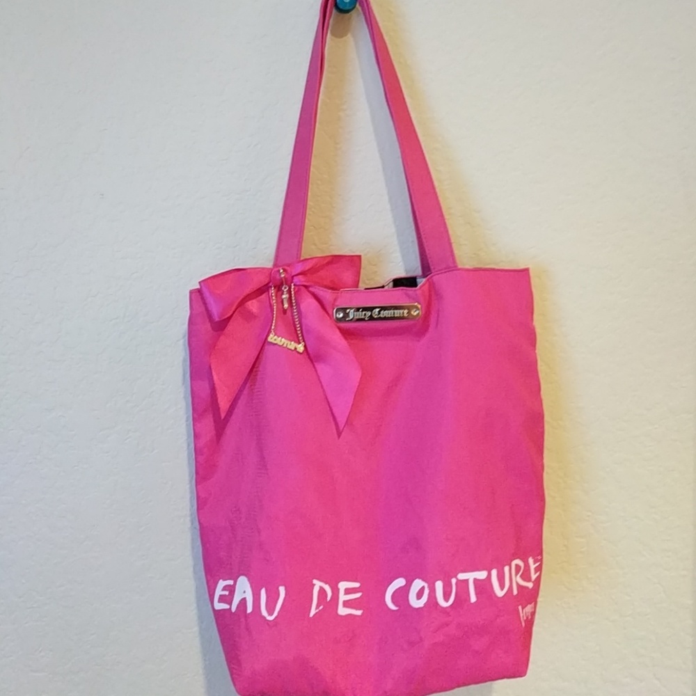 NWOT Juicy Couture pink bag. With charms!