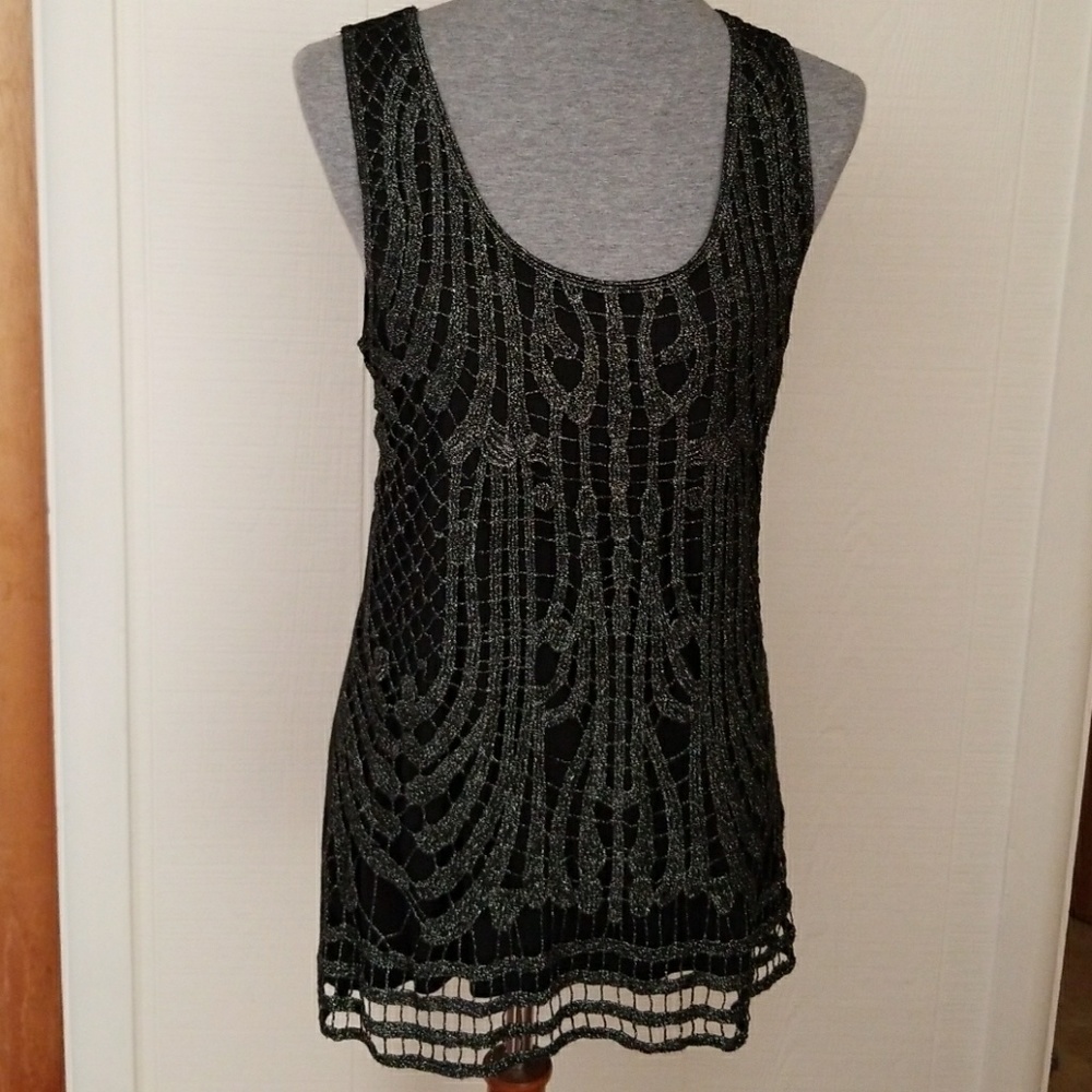 Sleeveless black top with silver webbing