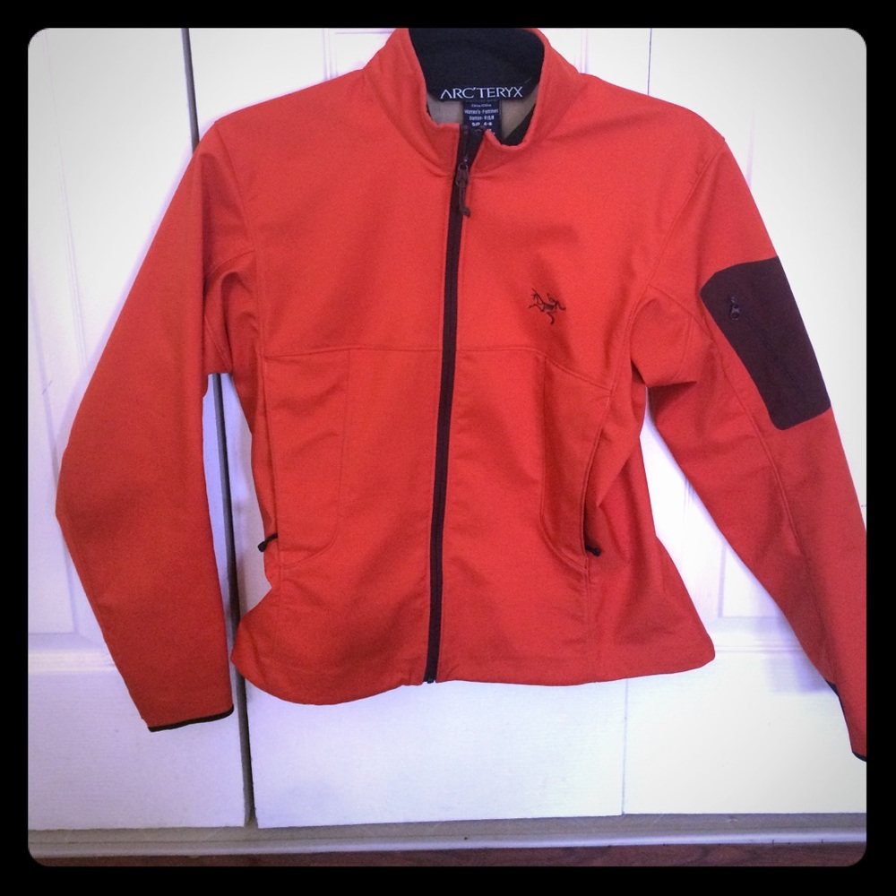 Orange Arcteryx shell jacket