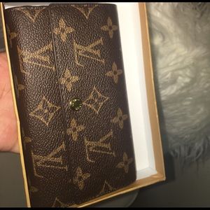 Louis Vuitton clutch wallet