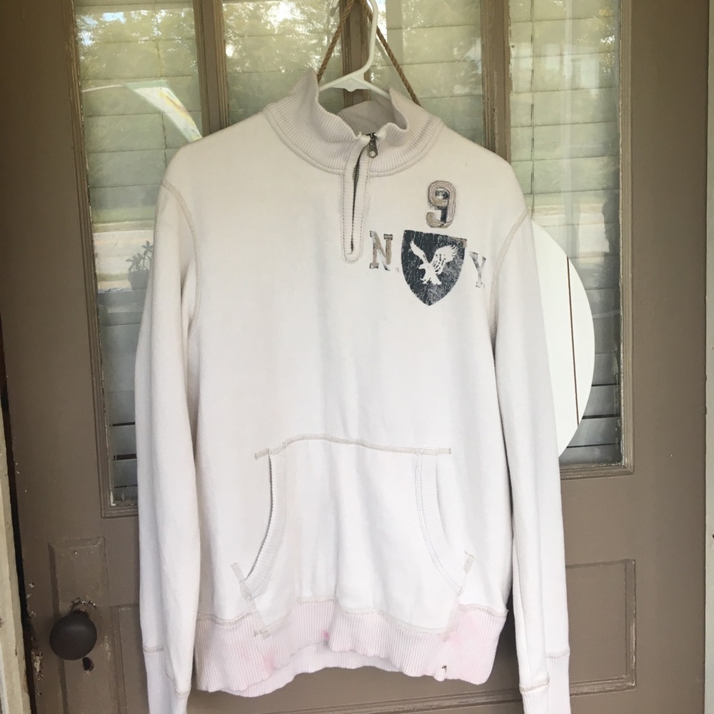Men's American Eagle sweater with pockets.