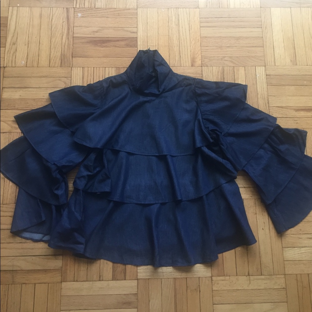 Blue ruffle turtle neck top