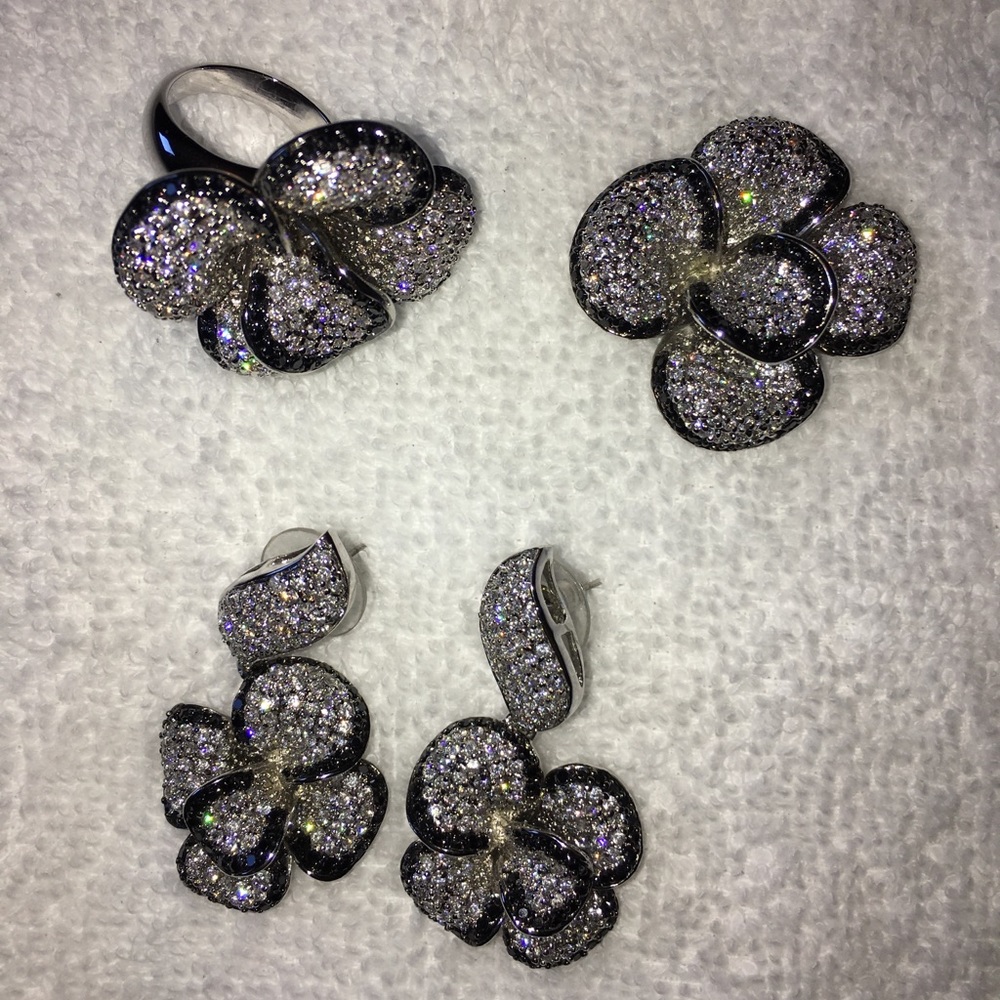 Earring, necklace charm and ring