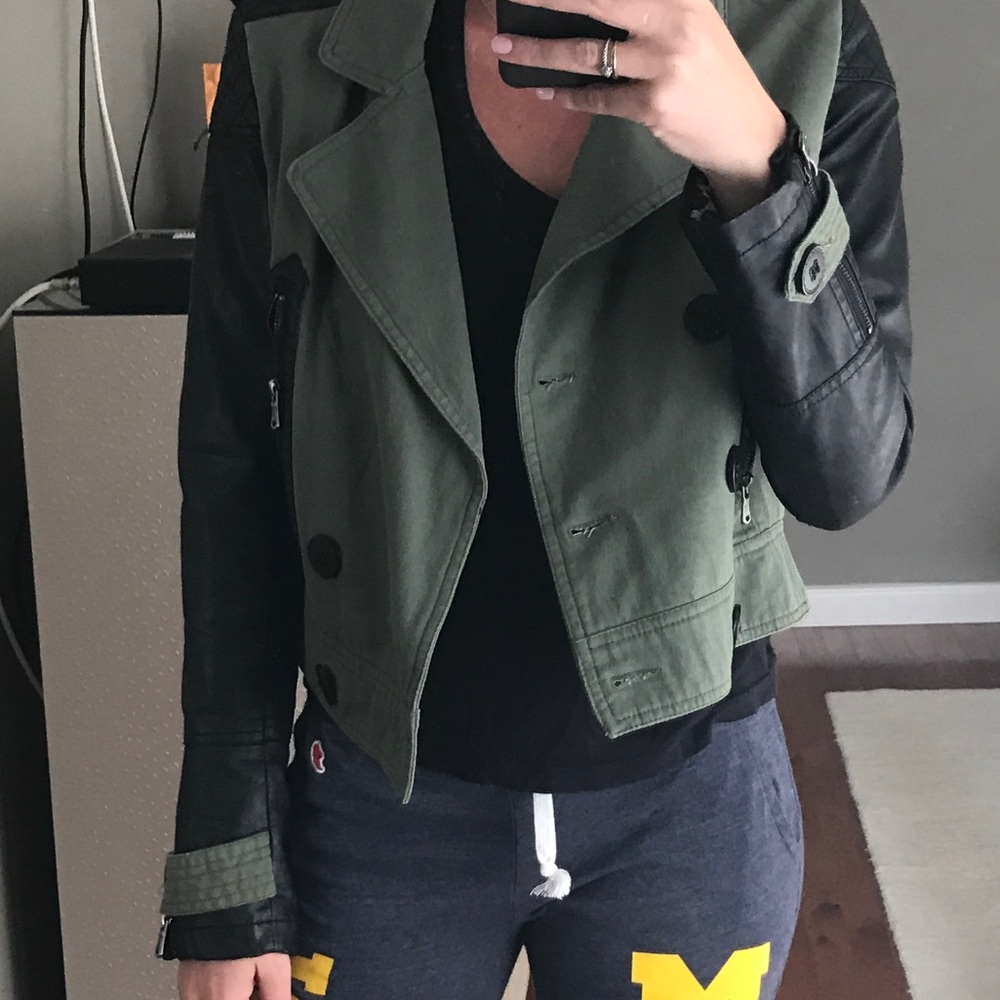 Green jacket with leather sleeves