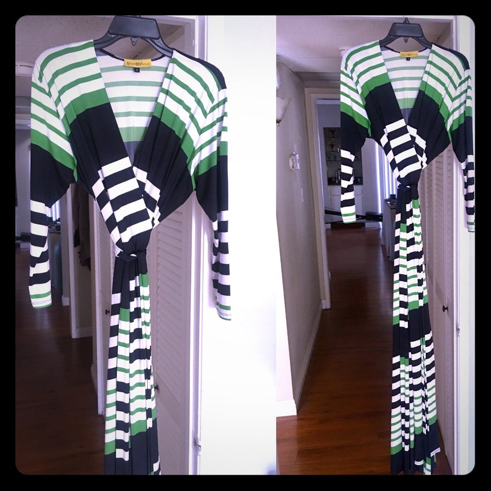 Beautiful long wrap dress. Never worn.