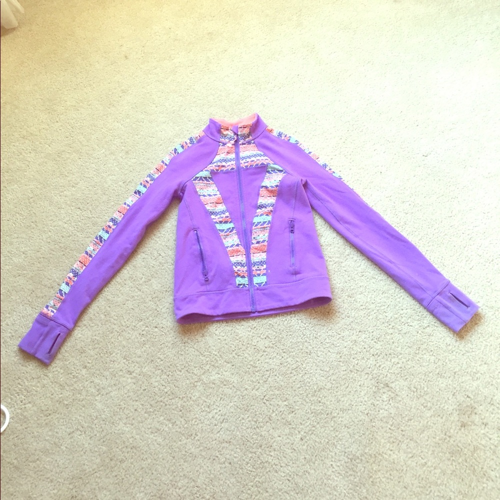 A size 8 girls Ivivva jacket in perfect quality.