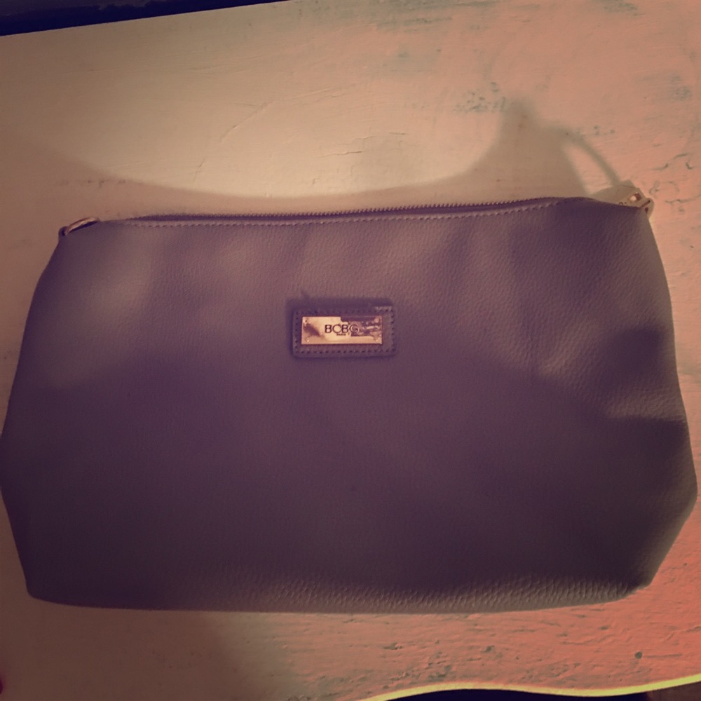 Gray bcbg zip purse.
