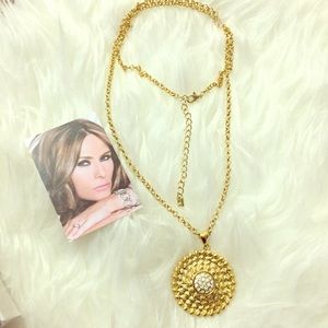 Gold large pendant necklace on a long chain NWOT