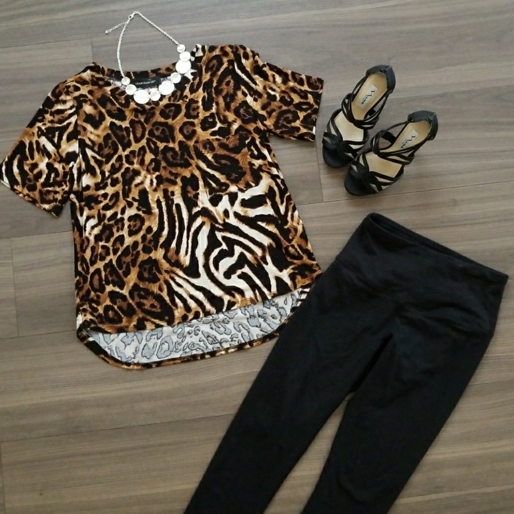 Cheetah print shirt.