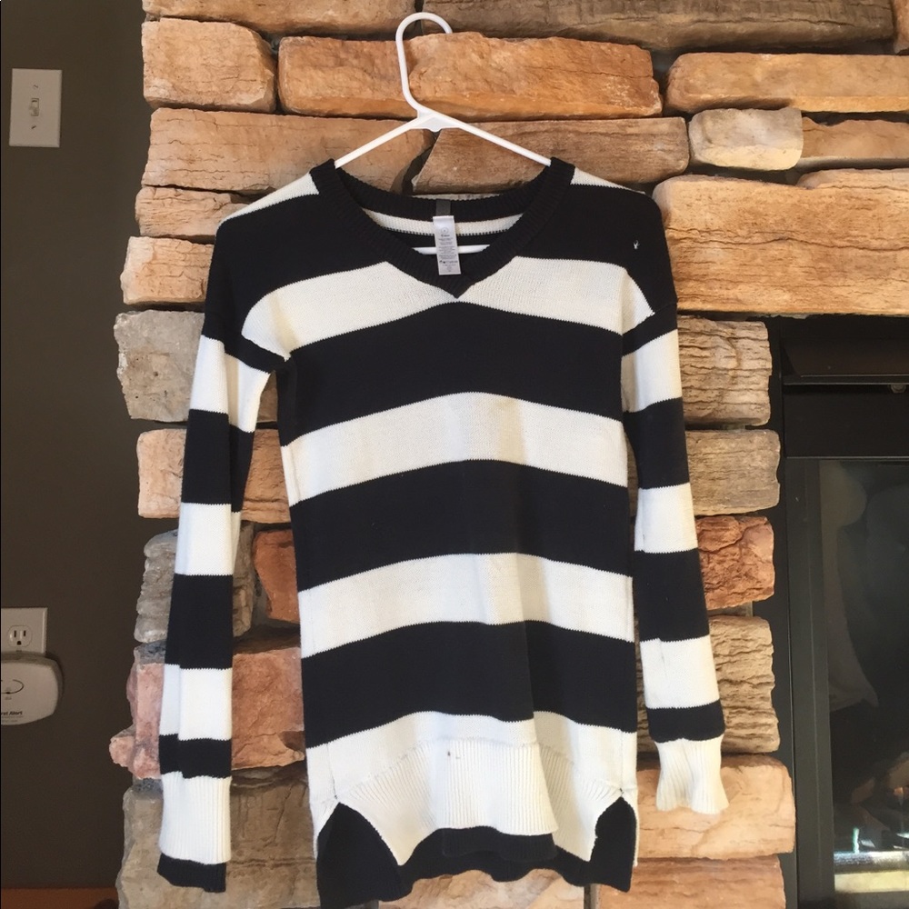 A size 8 black and white sweater by ivivva.