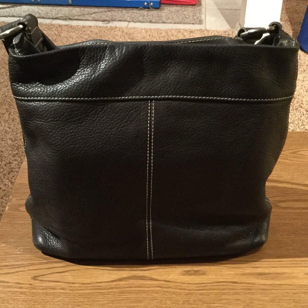 Gently used brown leather purse.