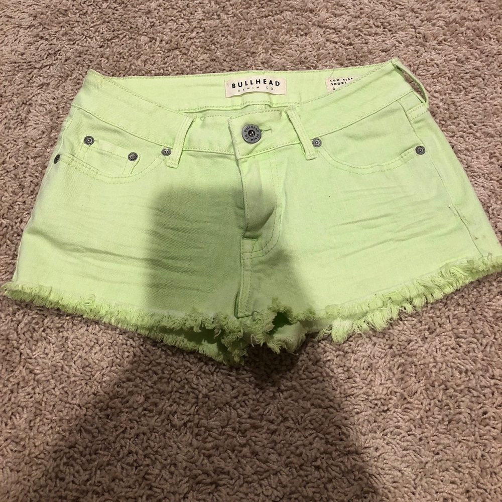 Low rise stretch denim neon green shorts