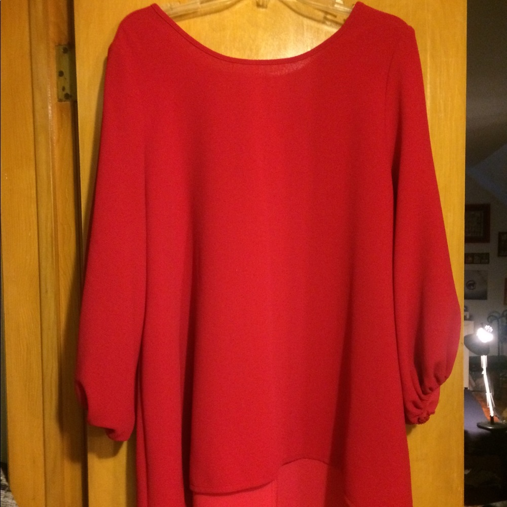 Red tunic blouse w/beautiful bow detail on back