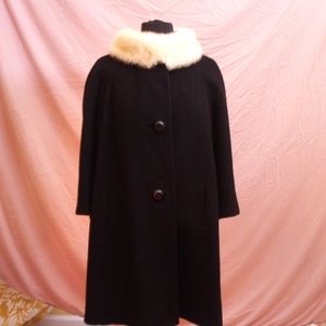 Black wool coat with white fur collar