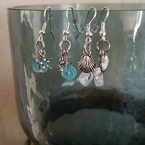2 sets of beach themed earrings.