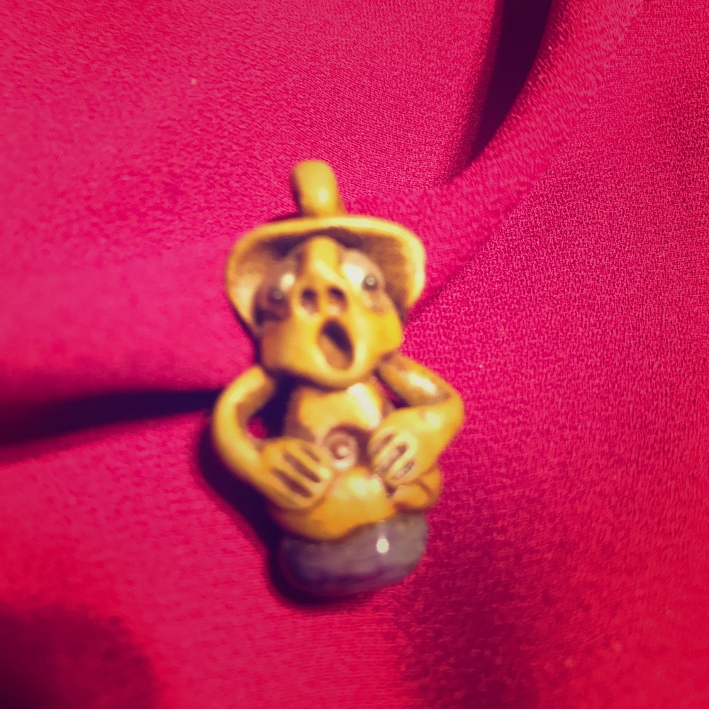 Unique figure pendant
