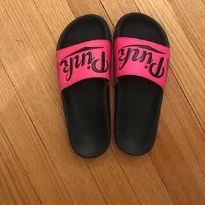 Never worn pink slides