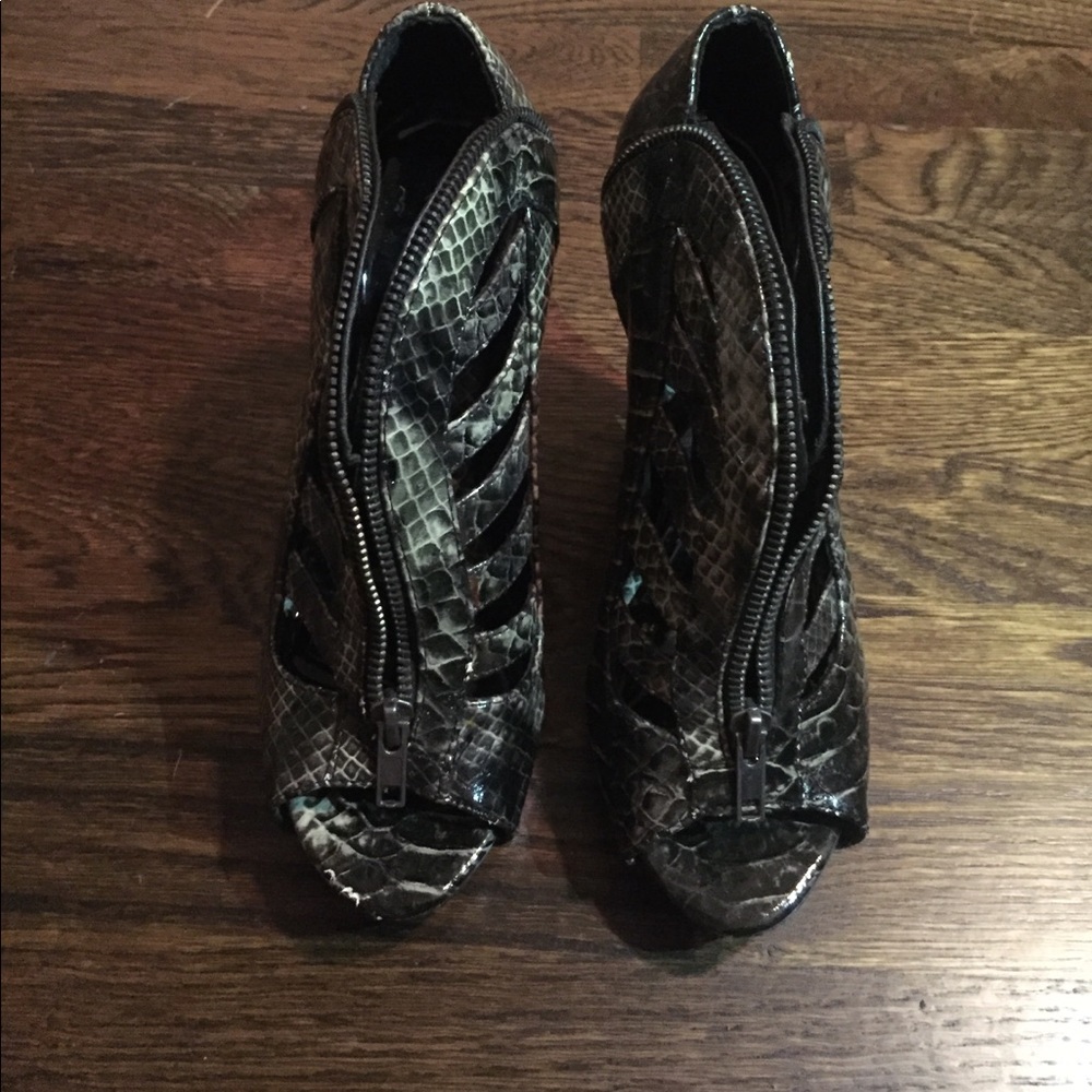 Snakeskin heeled booties