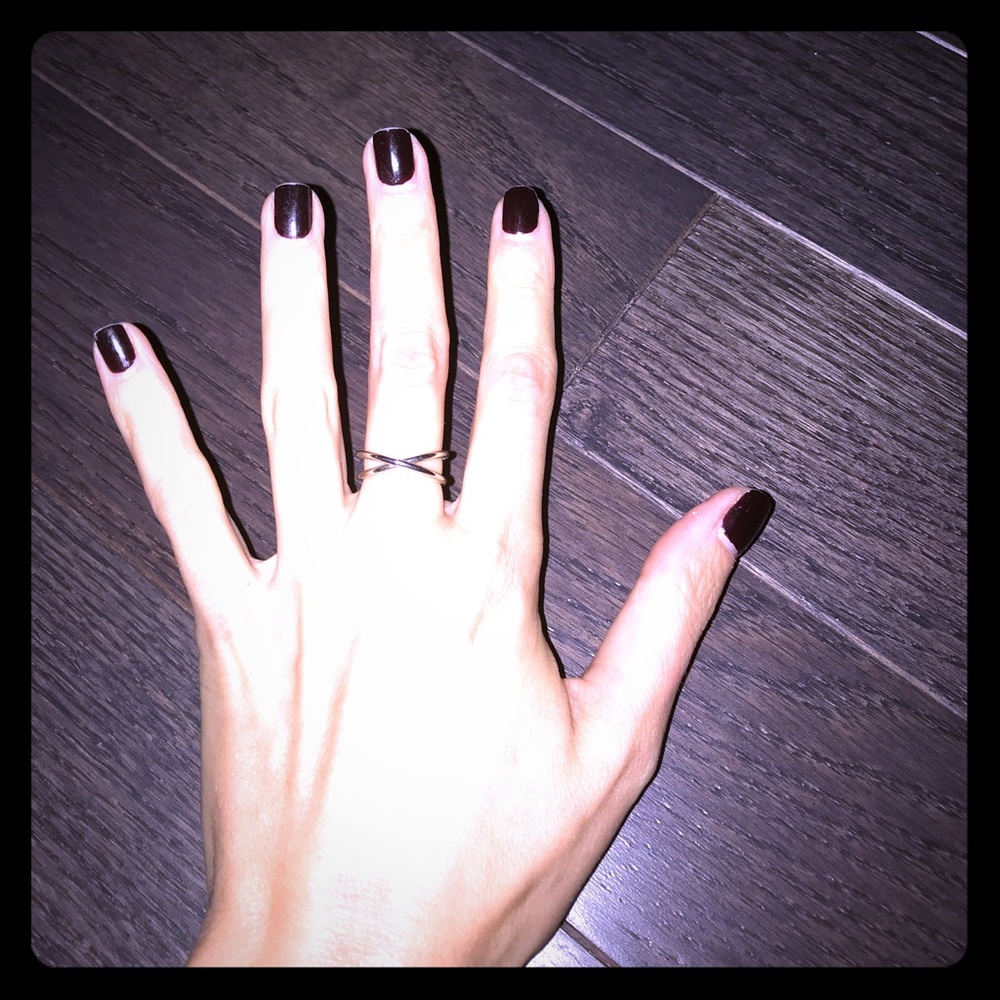 Delicate cris-cross silver ring.