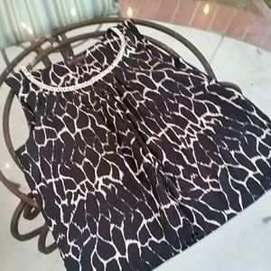 Black and cream top with chain detail