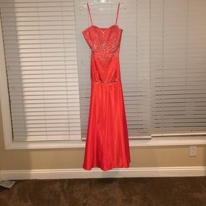 Orange jeweled prom dress