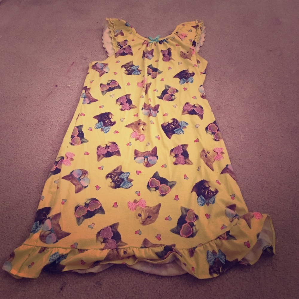 Yellow nightgown with cats